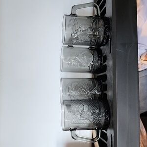 Set of 4 Rare McDonald's smoked  glasses.